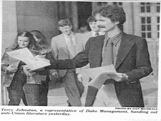 “Terry Johnston, a representative of Duke Management, handing out anti-Union literature" on Thursday, February 15th, 1979, the day before 2100 Duke Hospital employees were to vote on whether or not to unionize. (courtesy of The University Archive and “The Duke Chronicle”, photo by Dan Michaels)