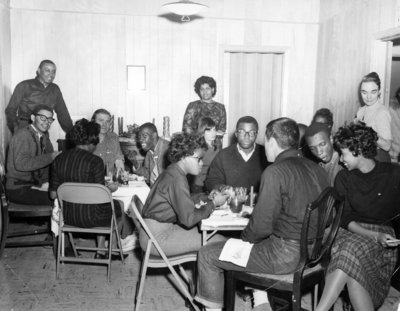 Christmas at the McKissick home on Roxboro Street, with CORE staff and volunteers in 1964.